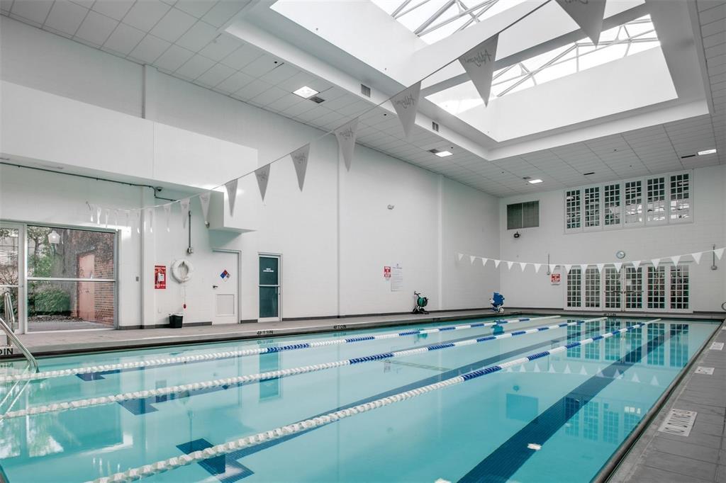 14683 Plage Lane Addison, TX 75001 - Photo 36 of 39 Indoor community pool featuring a skylight