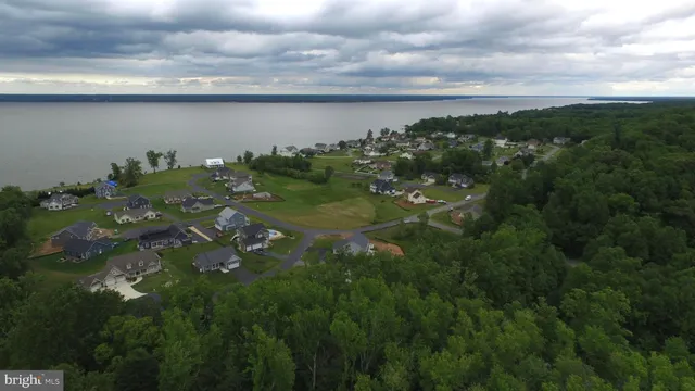 a view of a lake with a yard