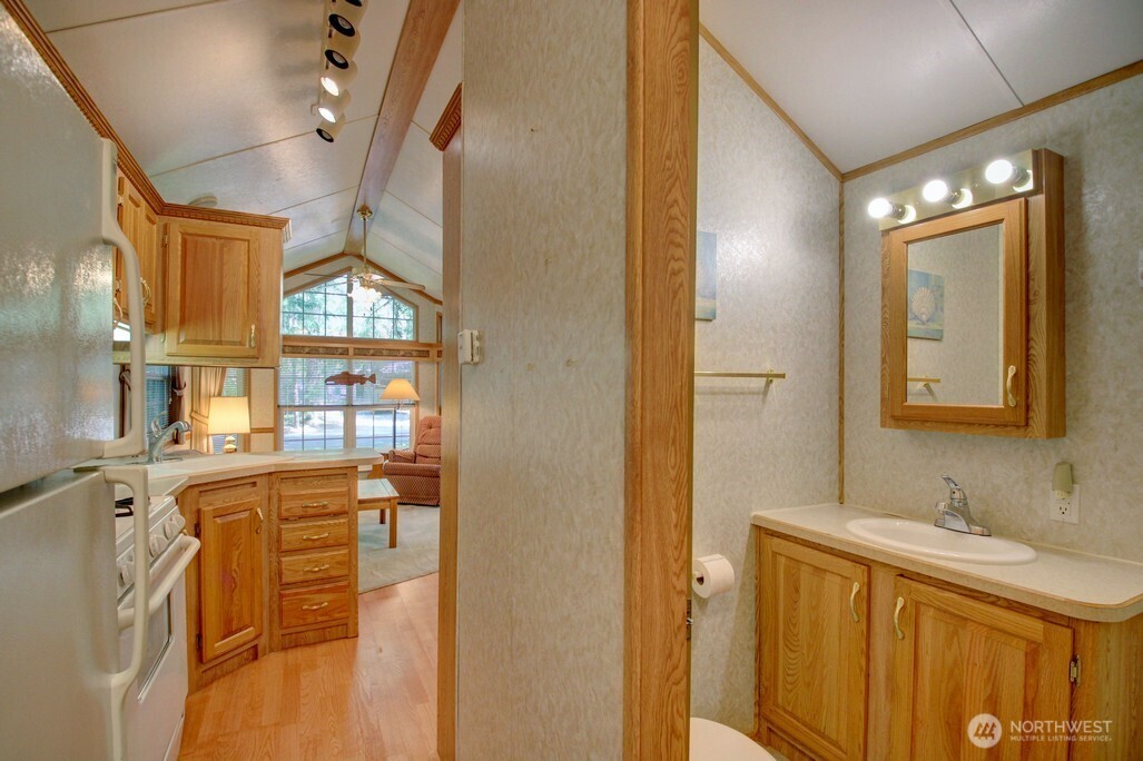 134 Drial Loop Maple Falls, WA 98266 - Photo 14 of 36 a bathroom with a sink and a mirror