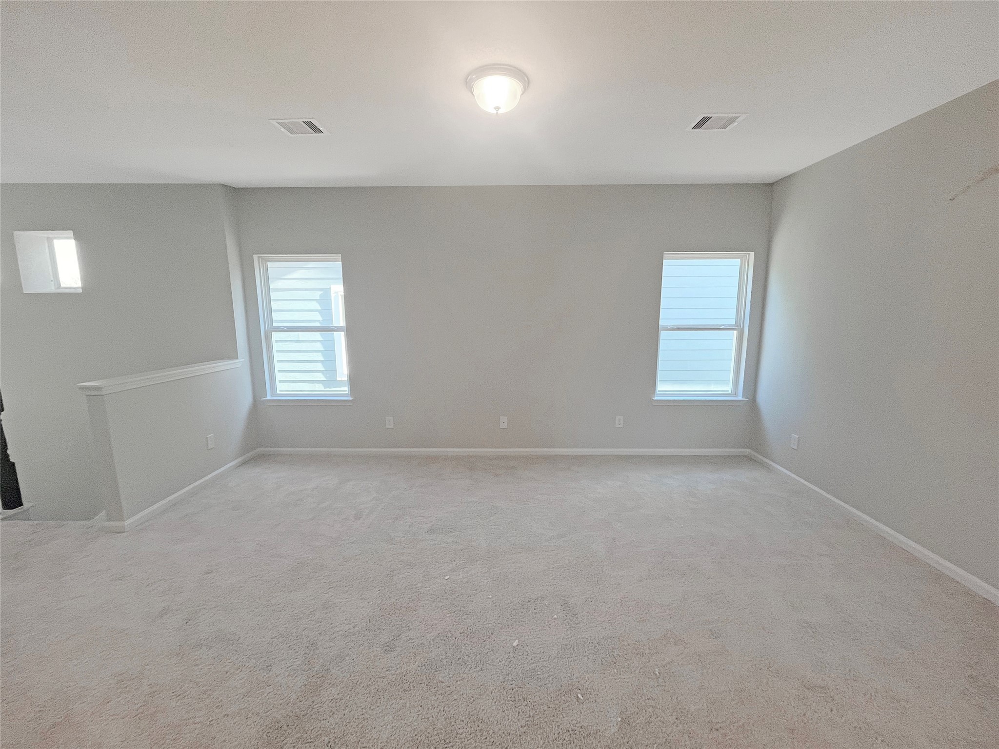 9765 Enclave Ridge Road Willis, TX 77318 - Photo 11 of 18 a view of an empty room with a window