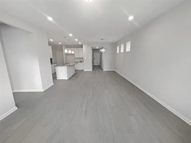 a view of a kitchen and window