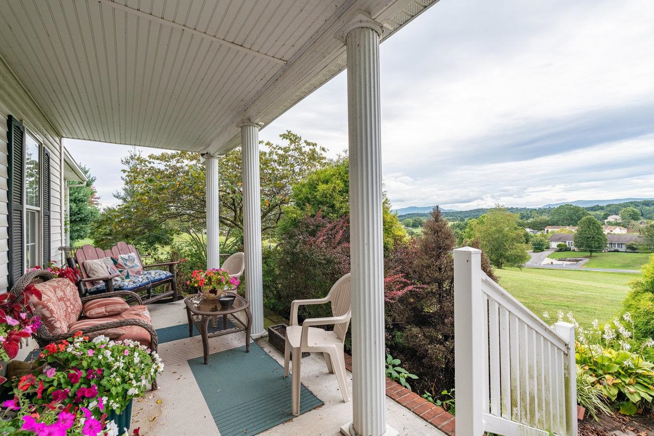 328 Morton Road Crimora, VA 24431 - Photo 3 of 32 a view of a porch with furniture and garden