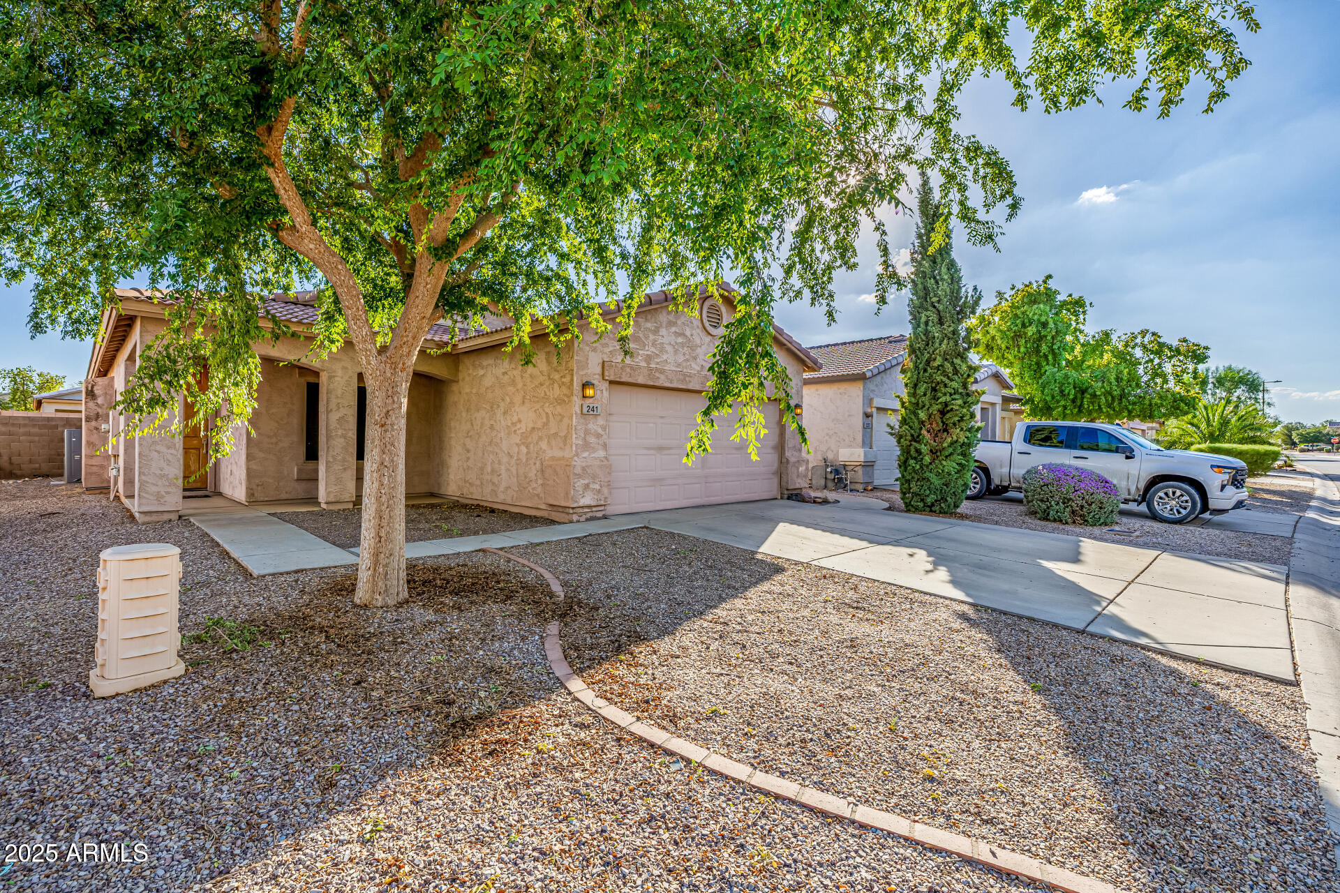 241 Mountain View Road San Tan Valley, AZ 85143 - Photo 13 of 62 a front view of a house with garden