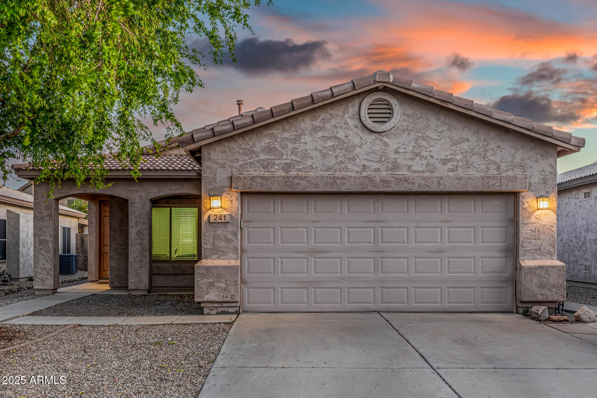 241 Mountain View Road San Tan Valley, AZ 85143 - Photo 2 of 62 a front view of a house with parking space