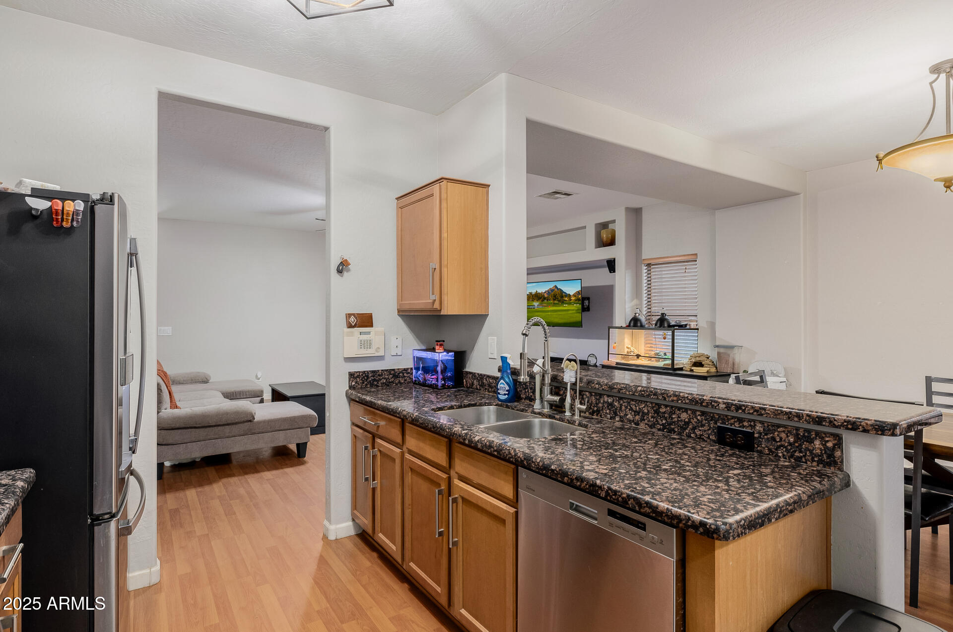 241 Mountain View Road San Tan Valley, AZ 85143 - Photo 27 of 62 a kitchen with a sink stove and cabinets