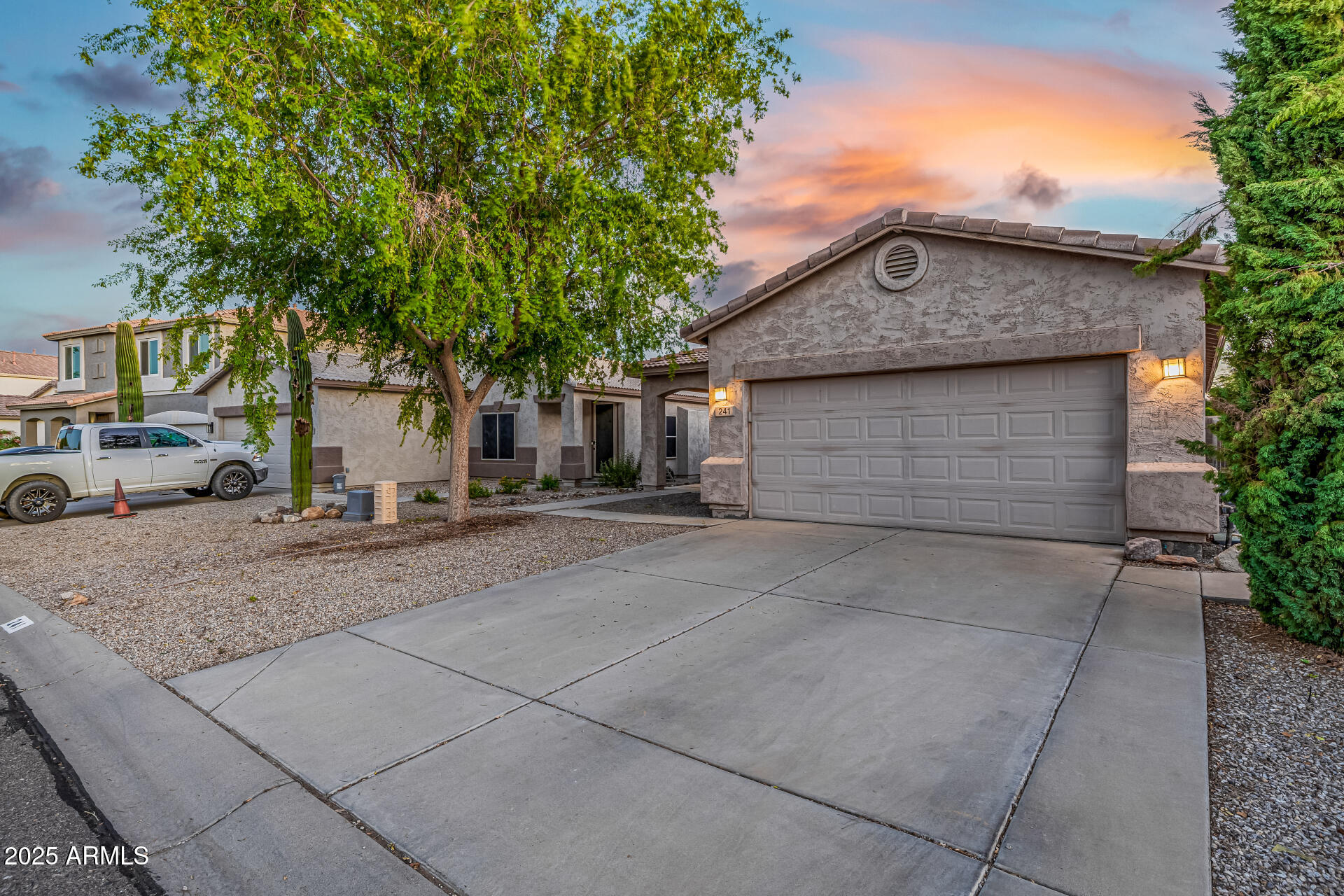 241 Mountain View Road San Tan Valley, AZ 85143 - Photo 3 of 62 a view of a car park in front of house