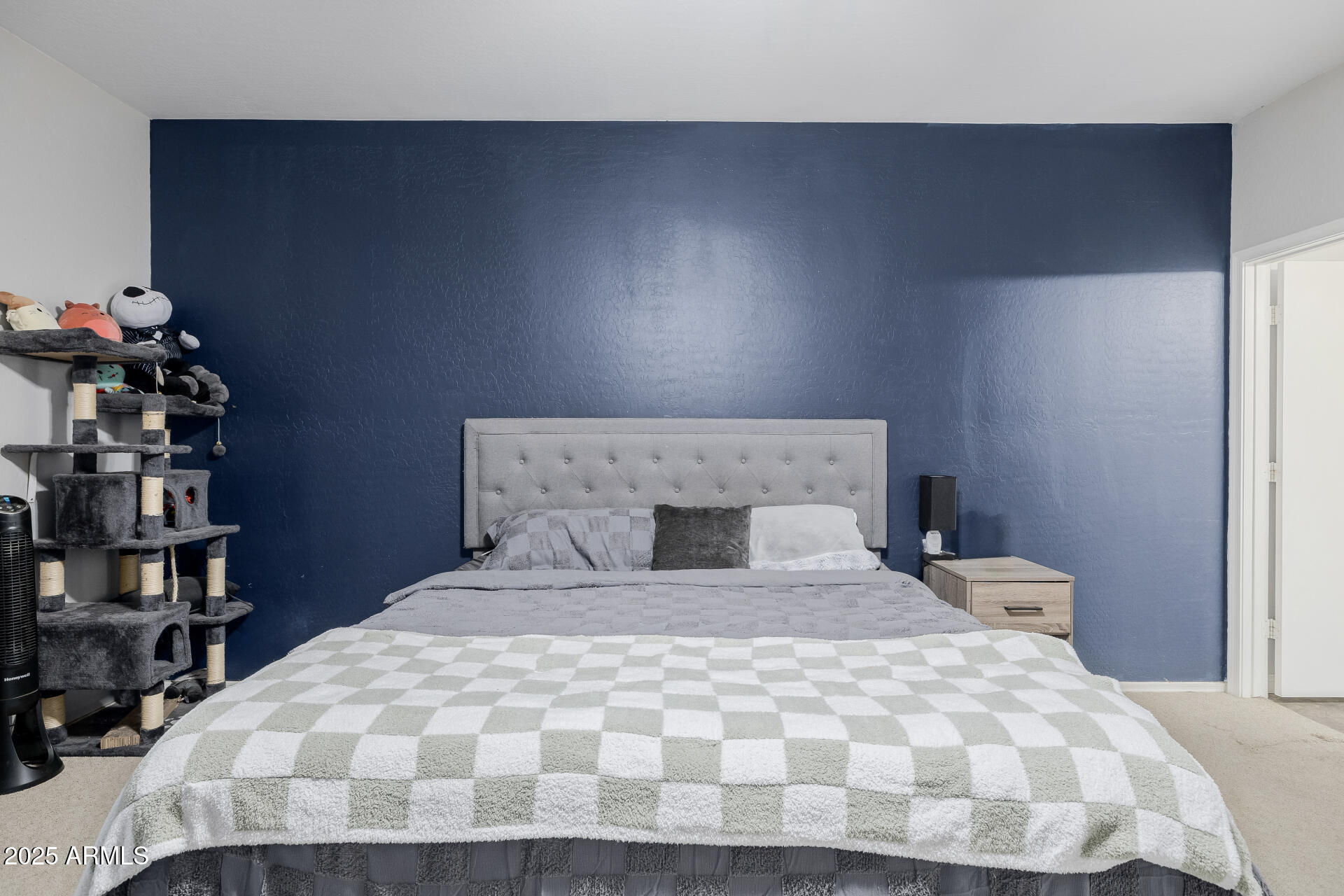 241 Mountain View Road San Tan Valley, AZ 85143 - Photo 37 of 62 a large bed sitting in a bedroom next to a window