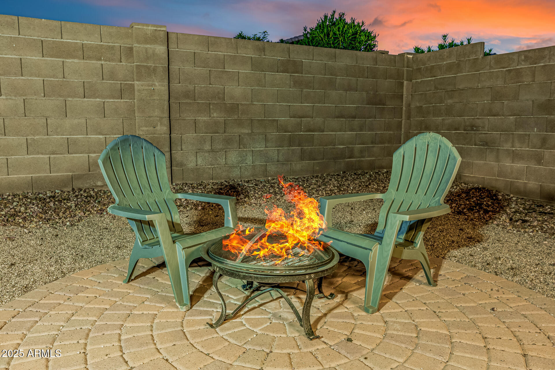241 Mountain View Road San Tan Valley, AZ 85143 - Photo 56 of 62 a view of a chair and table in the backyard