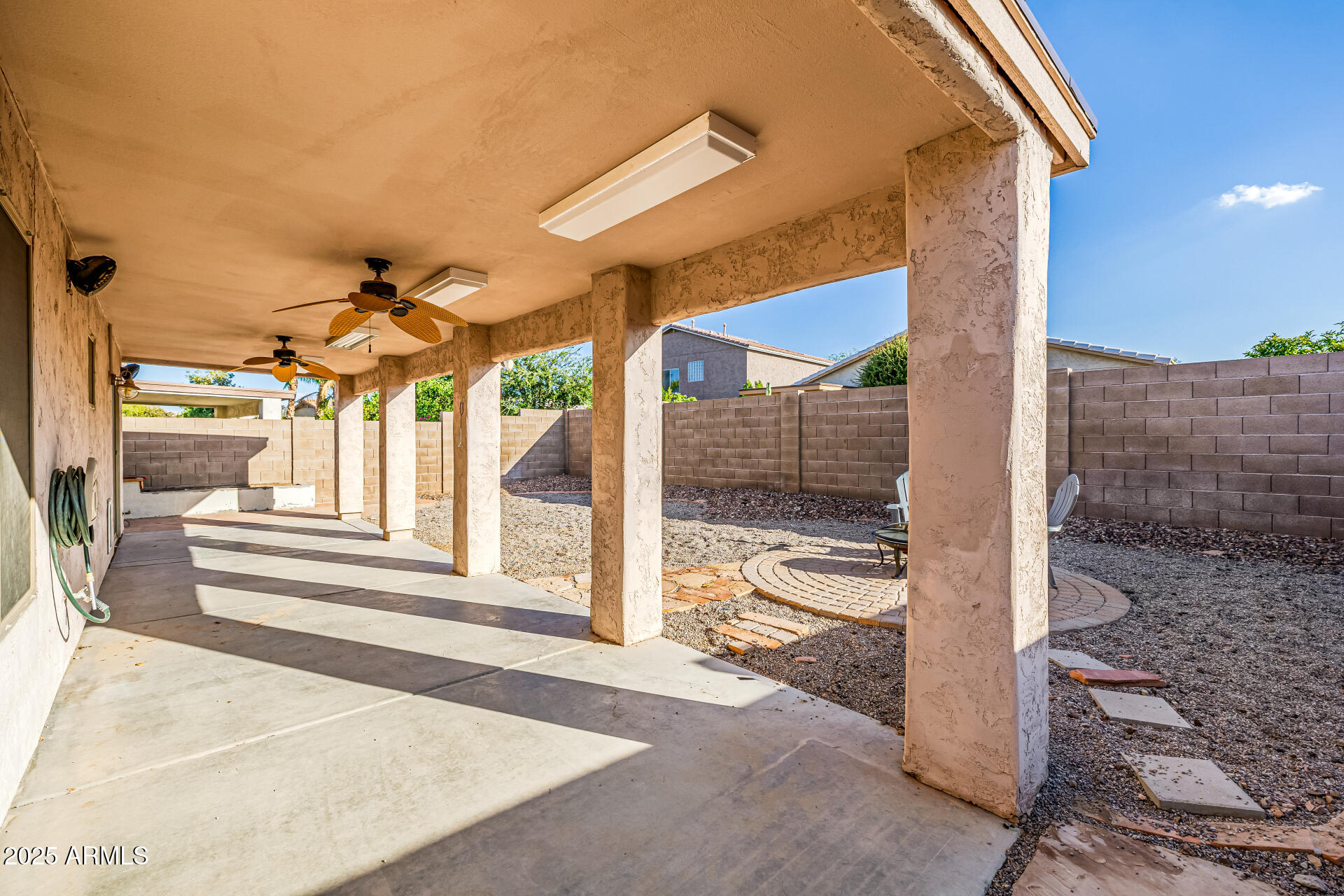 241 Mountain View Road San Tan Valley, AZ 85143 - Photo 57 of 62 a view of a house with a yard and garage