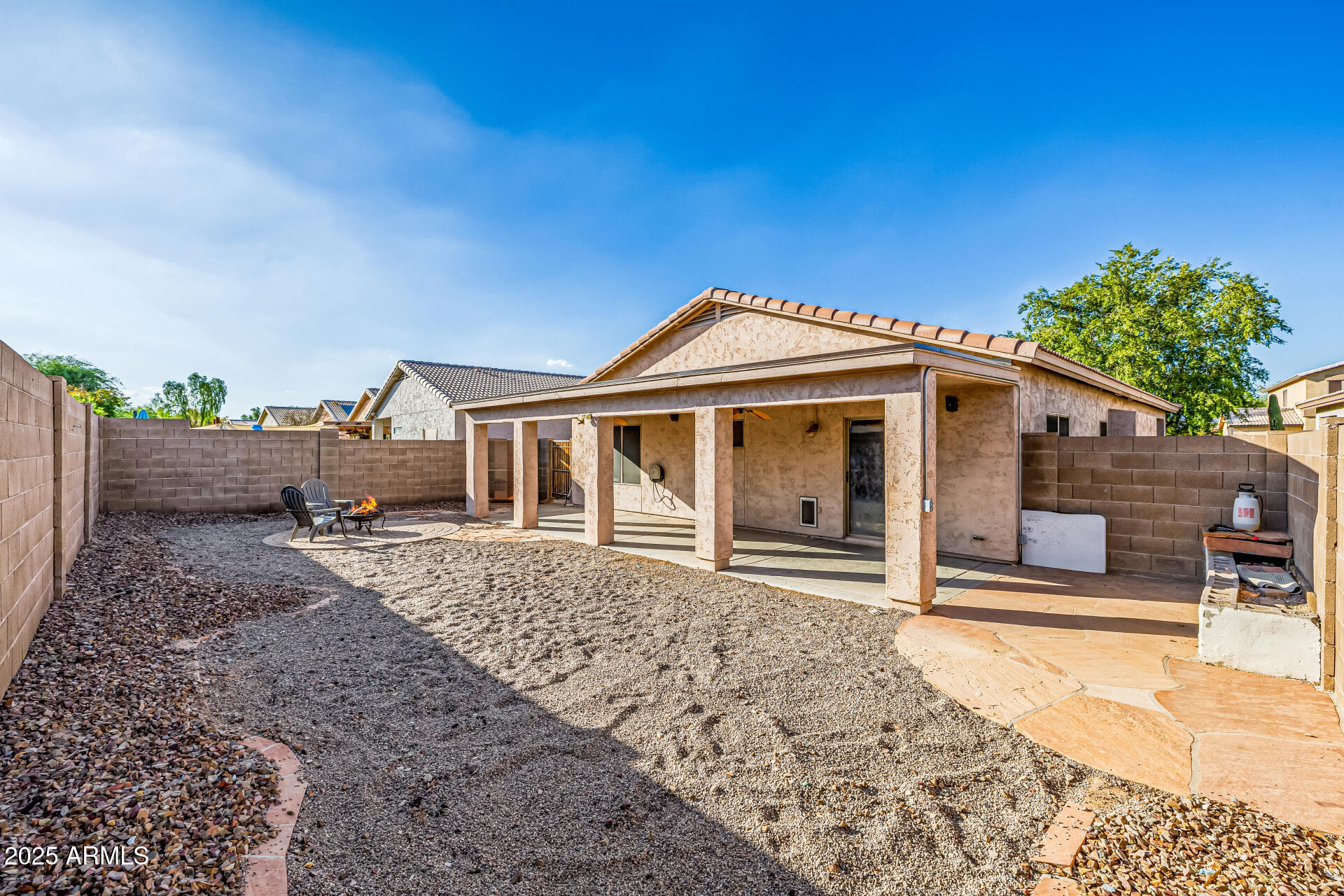 241 Mountain View Road San Tan Valley, AZ 85143 - Photo 59 of 62 a front view of a house with garden