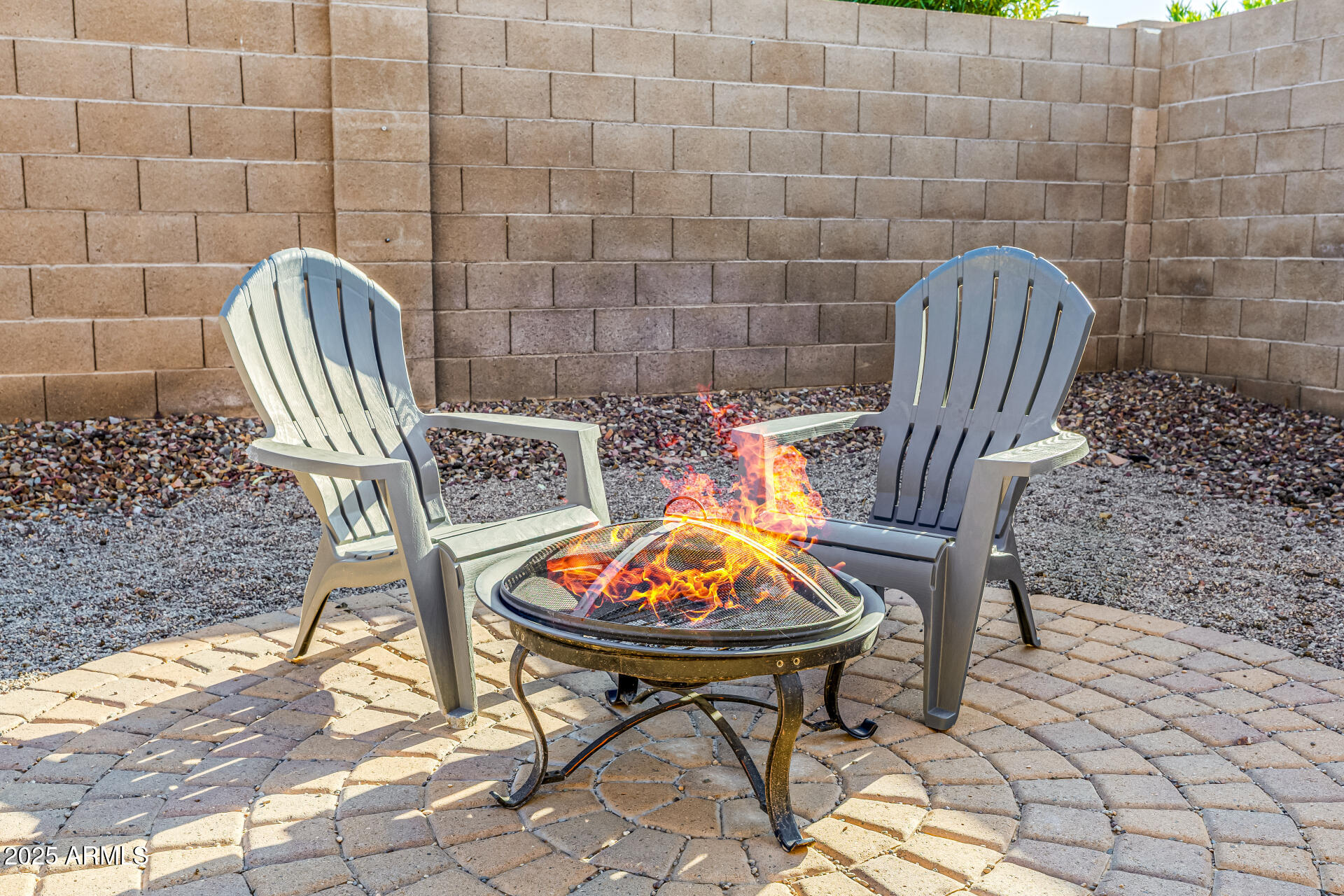 241 Mountain View Road San Tan Valley, AZ 85143 - Photo 62 of 62 a view of a chairs and table in backyard