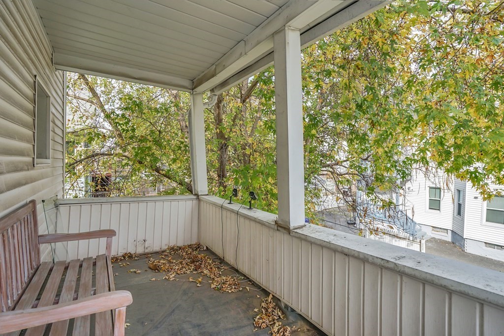 237-239 White Street Springfield, MA 01108 - Photo 12 of 31 a view of deck with a large trees