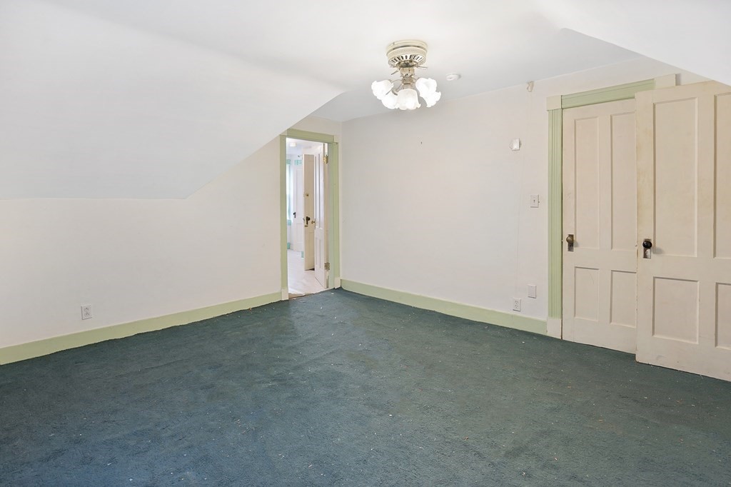 237-239 White Street Springfield, MA 01108 - Photo 21 of 31 an empty room with windows