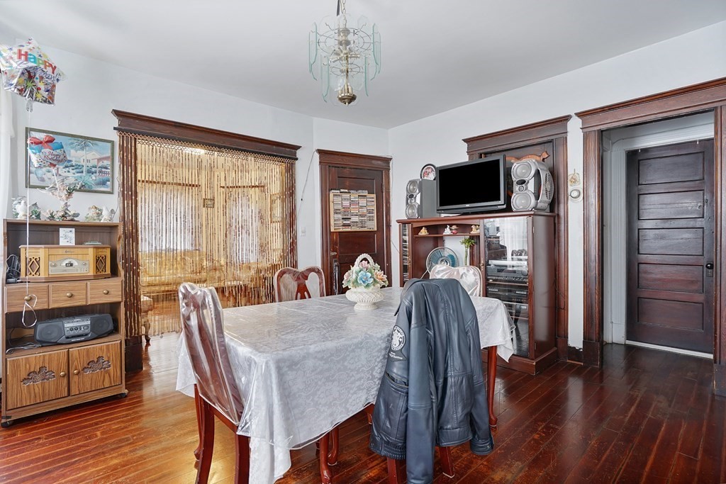 237-239 White Street Springfield, MA 01108 - Photo 25 of 31 a living room with fireplace furniture and a flat screen tv