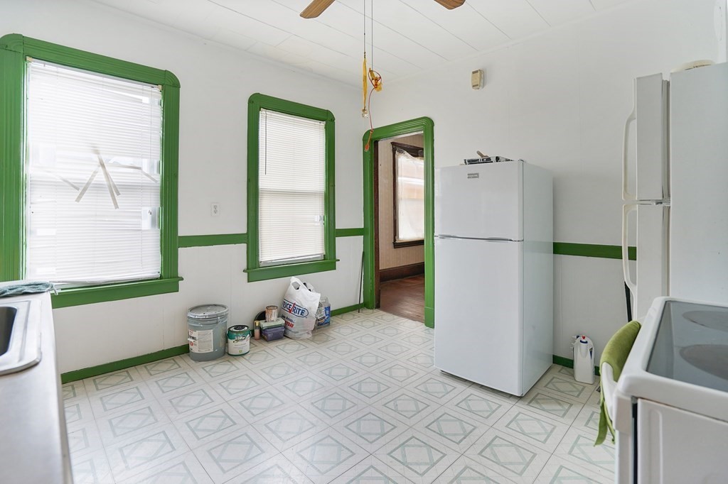 237-239 White Street Springfield, MA 01108 - Photo 8 of 31 a bathroom with a bathtub sink and toilet