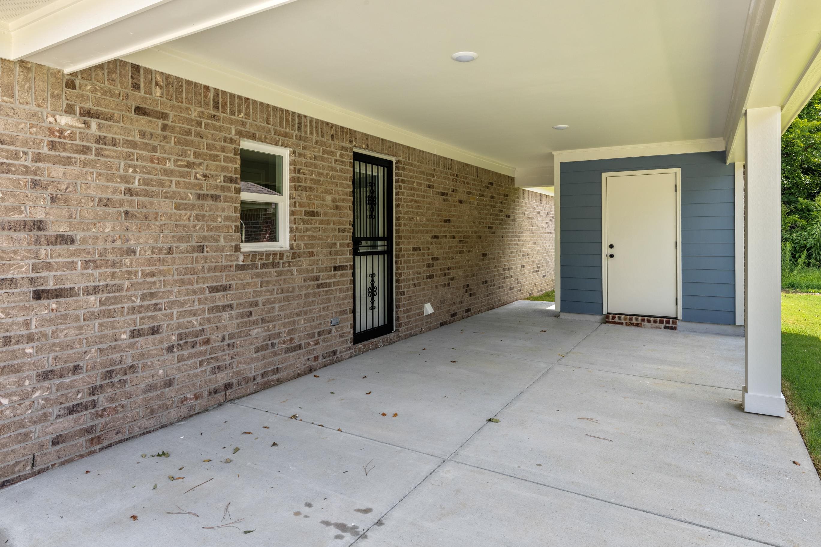 5279 Zodiac Road Memphis, TN 38118 - Photo 4 of 22 a view of a brick house with an empty space