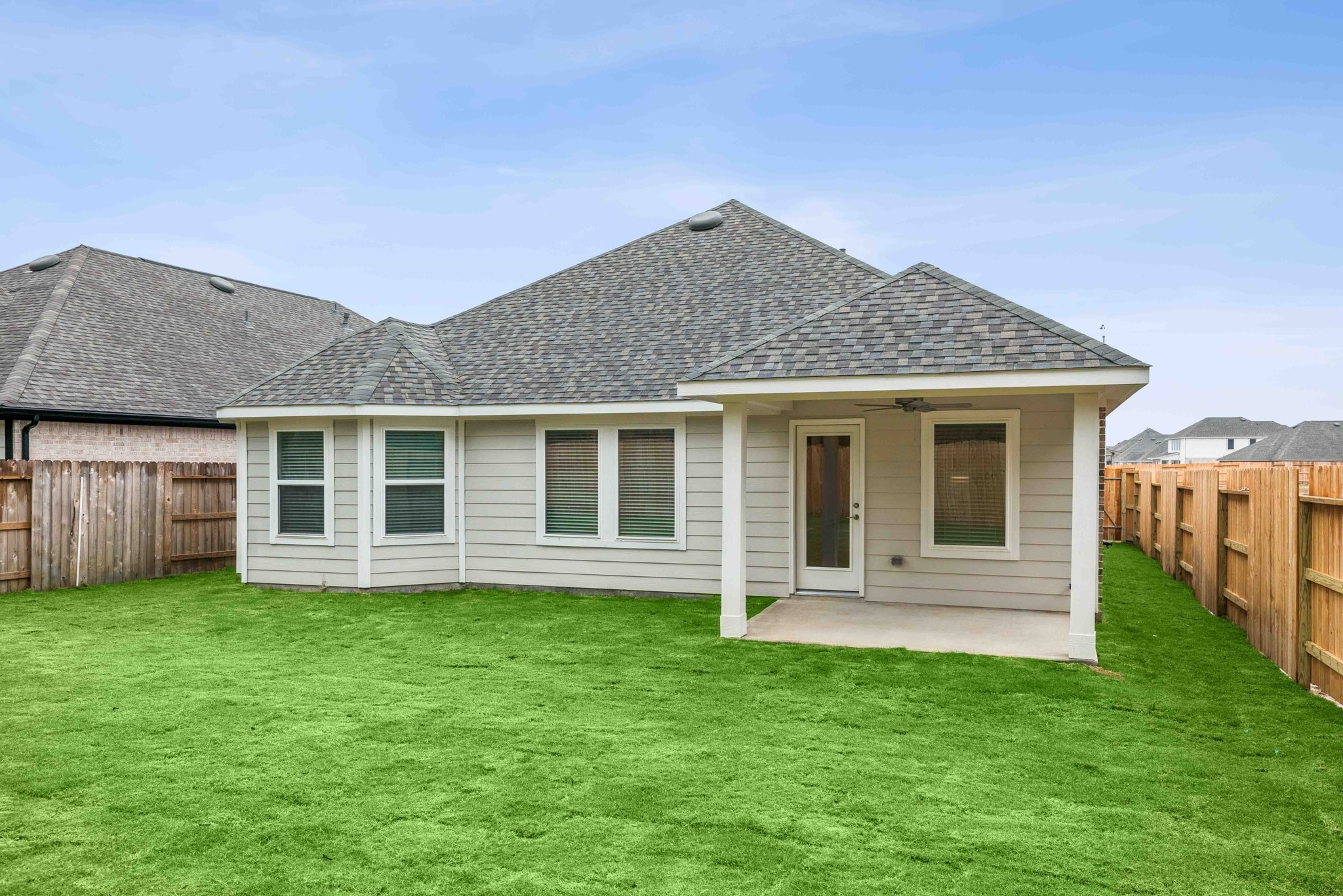 1816 Sleeping Hls Drive Rosenberg, TX 77471 - Photo 4 of 12 a front view of a house with a yard