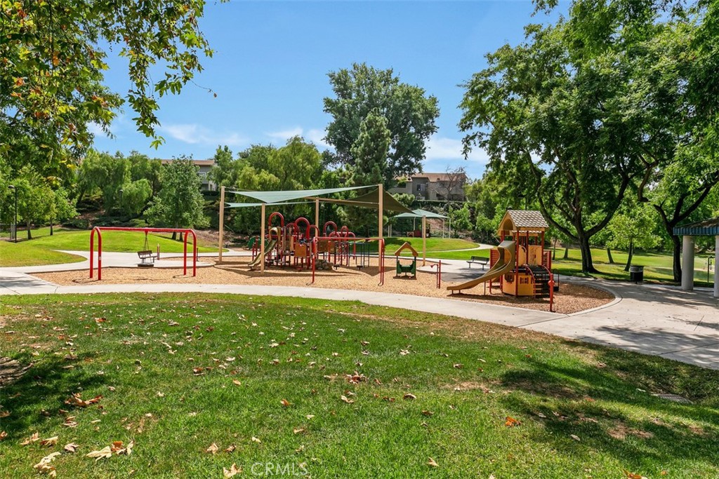 21981 Rimhurst Drive, Unit P160 Lake Forest, CA 92630 - Photo 30 of 35 a view of a park with swings