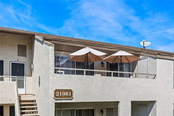 a house with trees in front of it