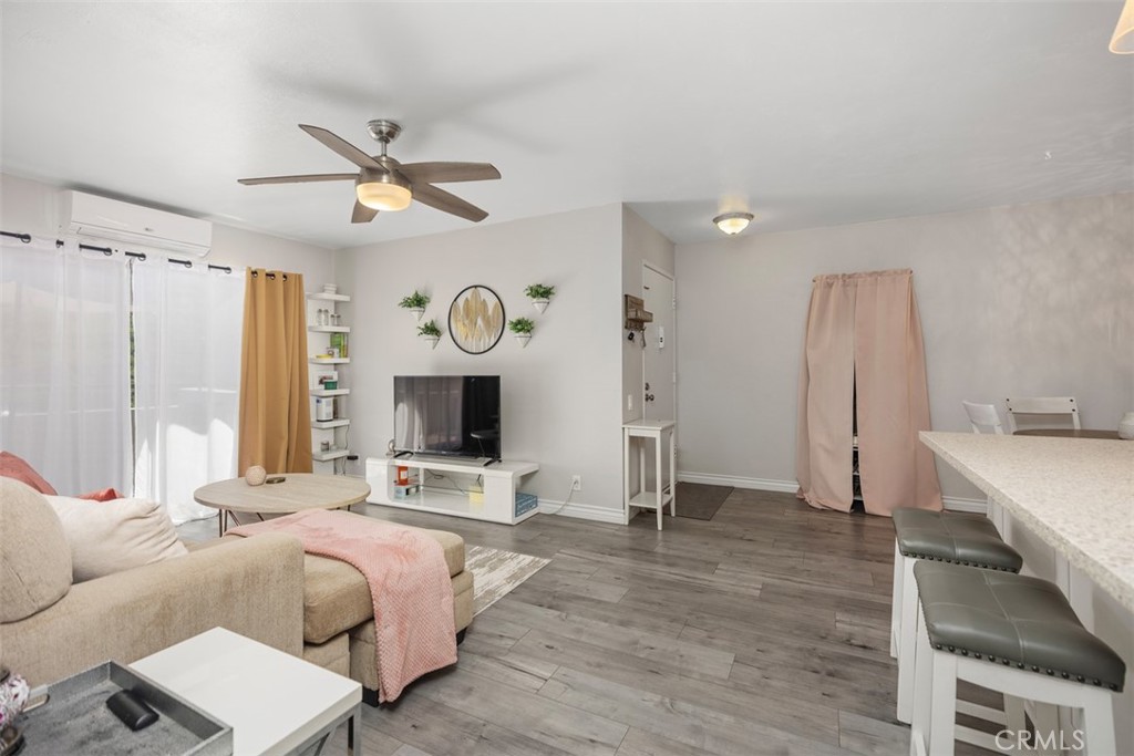21981 Rimhurst Drive, Unit P160 Lake Forest, CA 92630 - Photo 10 of 35 a spacious bedroom with a bed window and a mirror