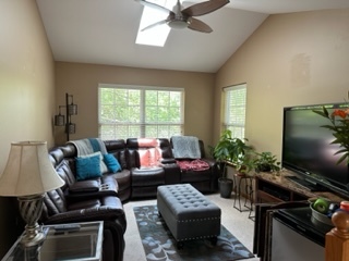 426 Vaughn Circle Aurora, IL 60502 - Photo 15 of 19 a living room with furniture and a flat screen tv