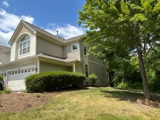 426 Vaughn Circle Aurora, IL 60502 - Photo 2 of 19 a view of a house with a yard