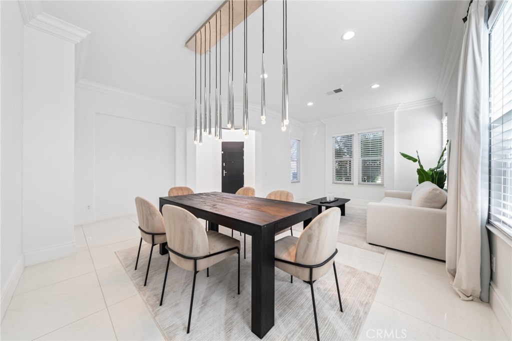 6069 Cannich Road Riverside, CA 92507 - Photo 28 of 75 a dining room with furniture and window