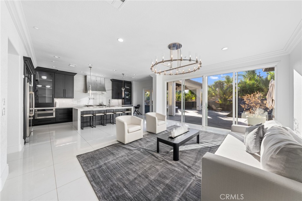 6069 Cannich Road Riverside, CA 92507 - Photo 36 of 75 a living room with furniture and a large window