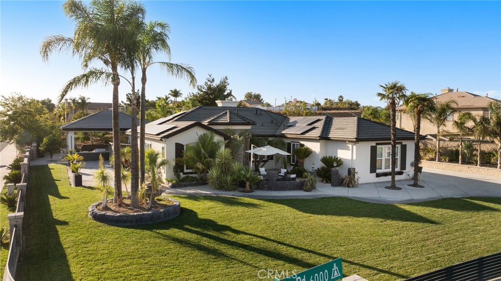 6069 Cannich Road Riverside, CA 92507 - Photo 4 of 75 a front view of a house with swimming pool