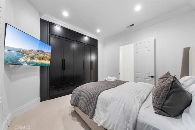 a view of a patio with couches and potted plants