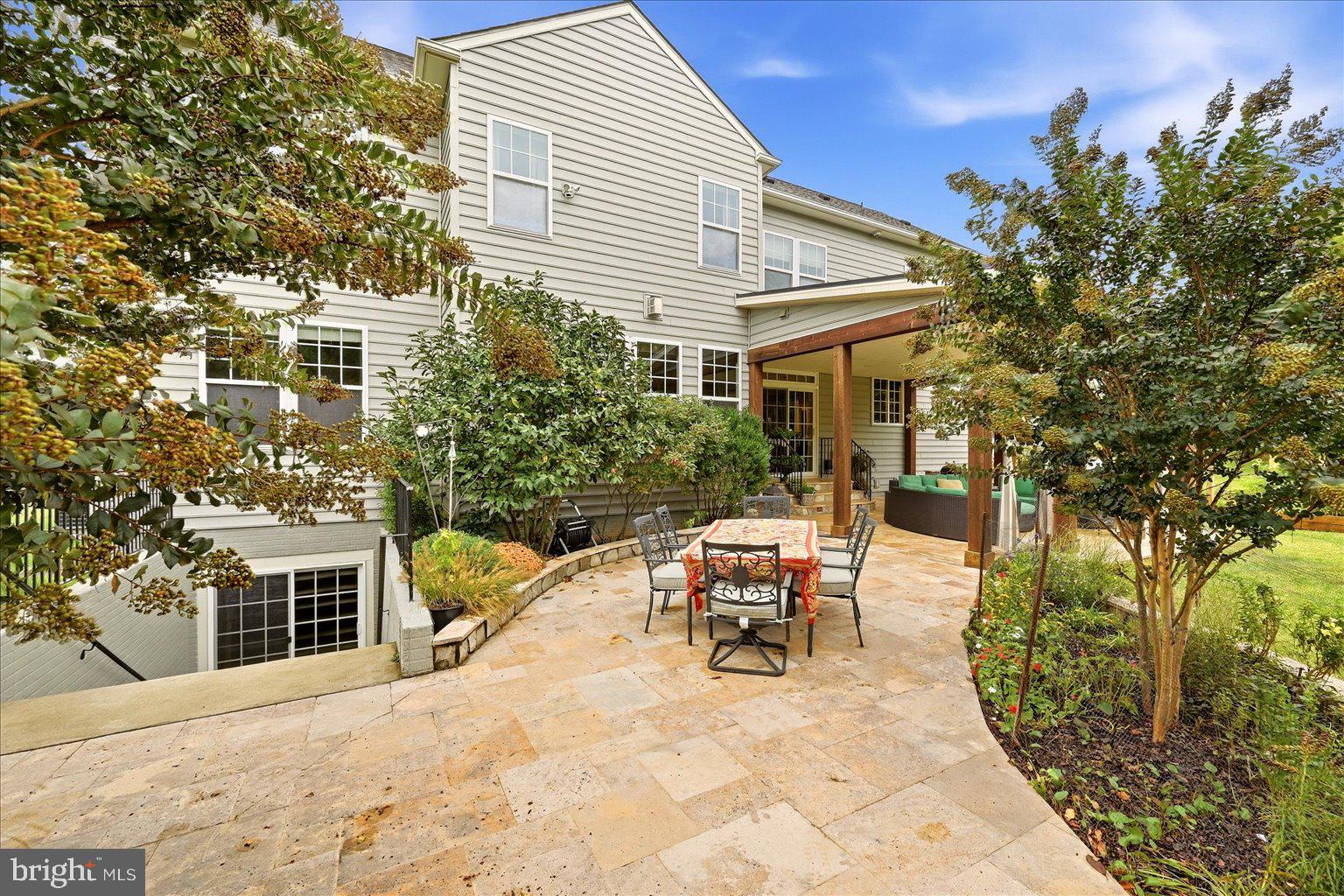 15547 Montresor Road Leesburg, VA 20176 - Photo 64 of 92 Travertine patio and landscaping