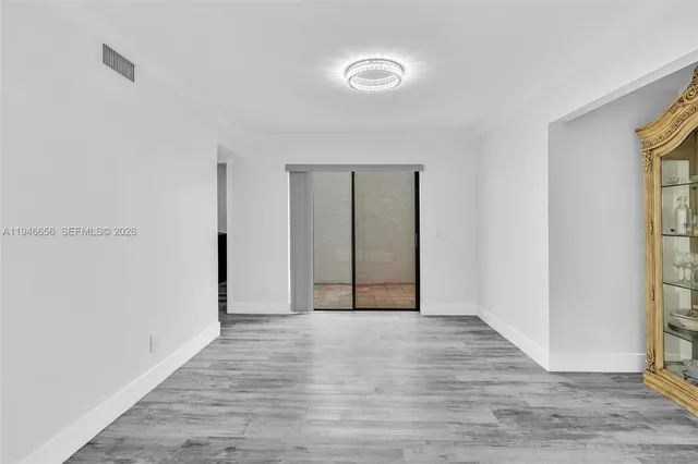 a bathroom with a bathtub and a sink