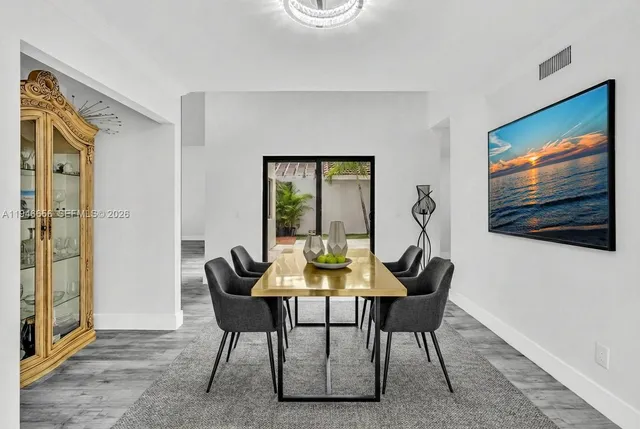 a view of kitchen with wooden floor