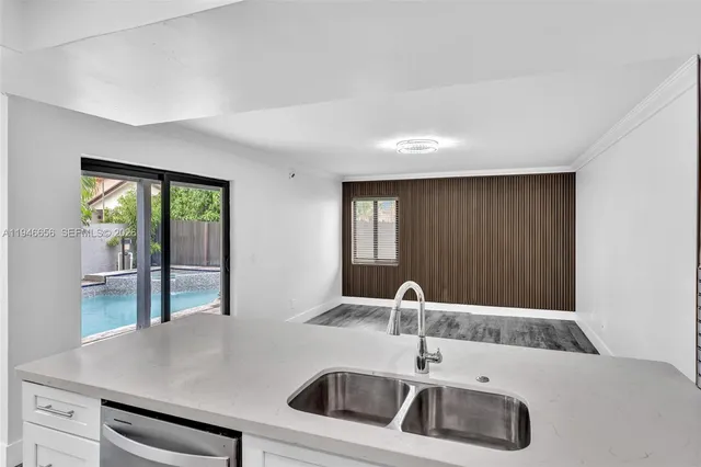 a living room with a couch and a flat screen tv