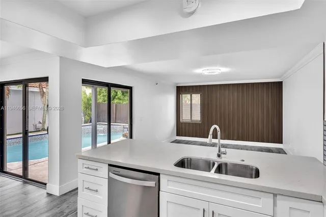 a bathroom with a shower a toilet and a sink