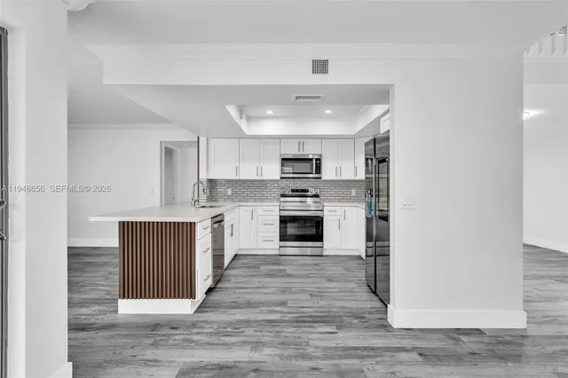 a view of backyard with green space