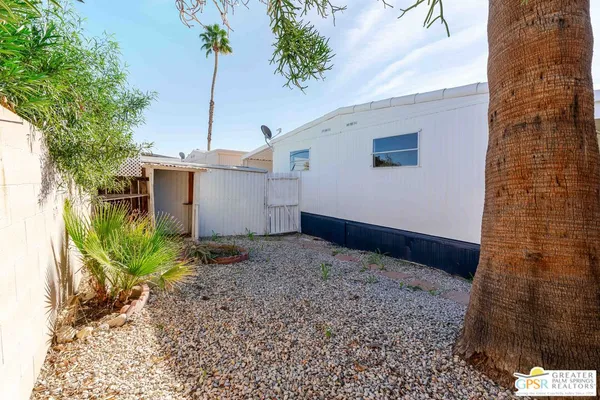 a house with trees in front of it