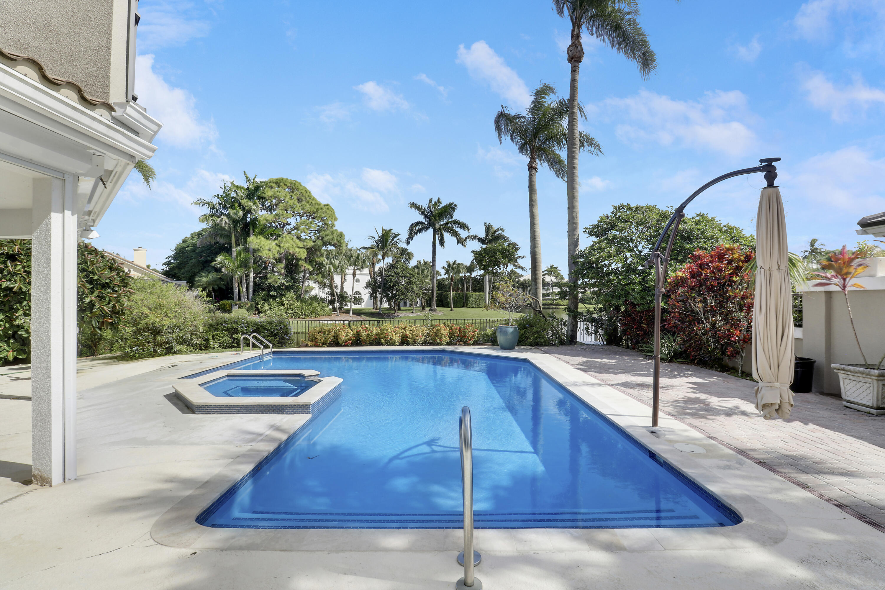 204 Chinook Lane Jupiter, FL 33458 - Photo 18 of 30 a view of swimming pool with a patio