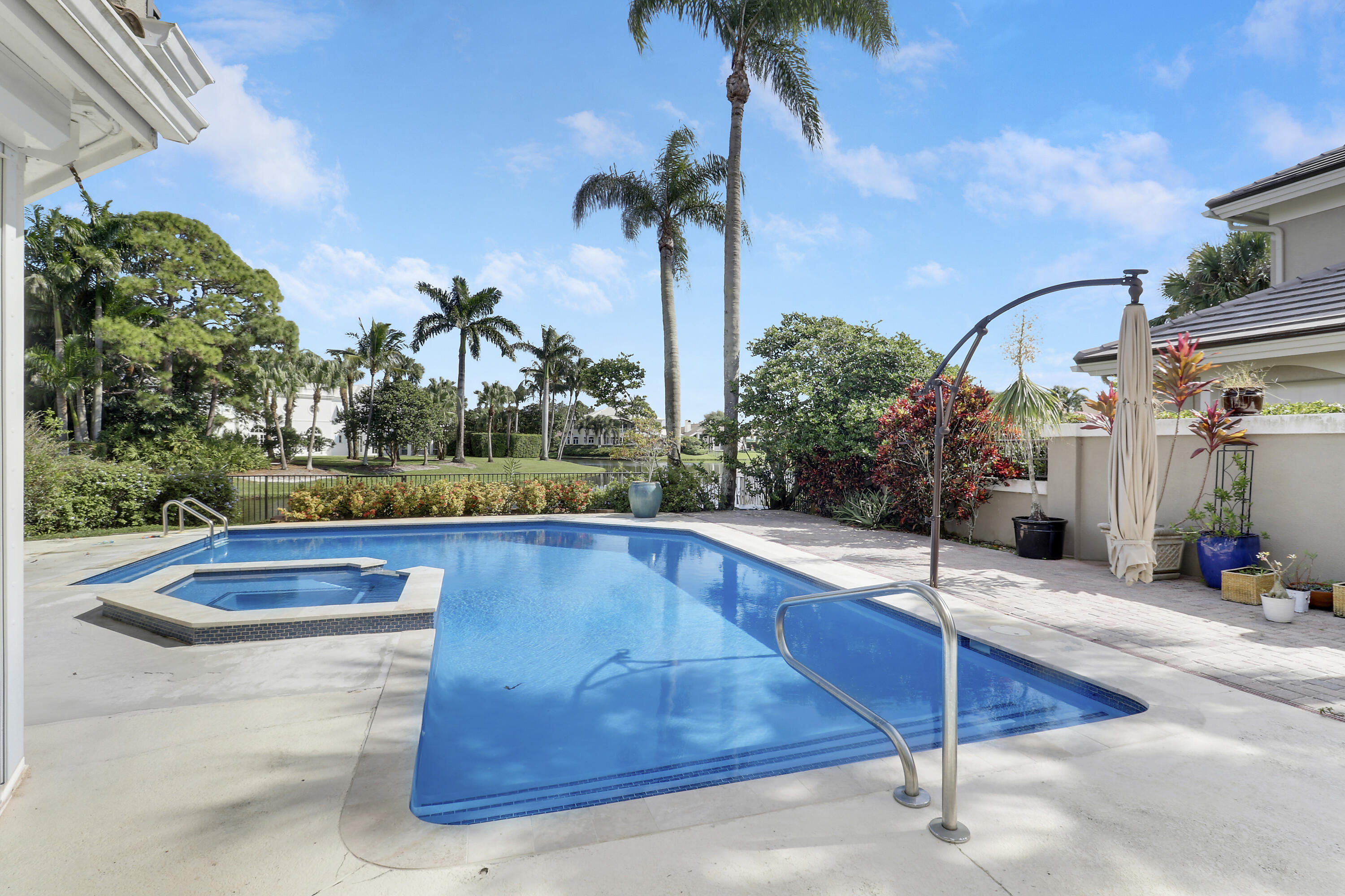 204 Chinook Lane Jupiter, FL 33458 - Photo 19 of 30 a view of swimming pool with a patio