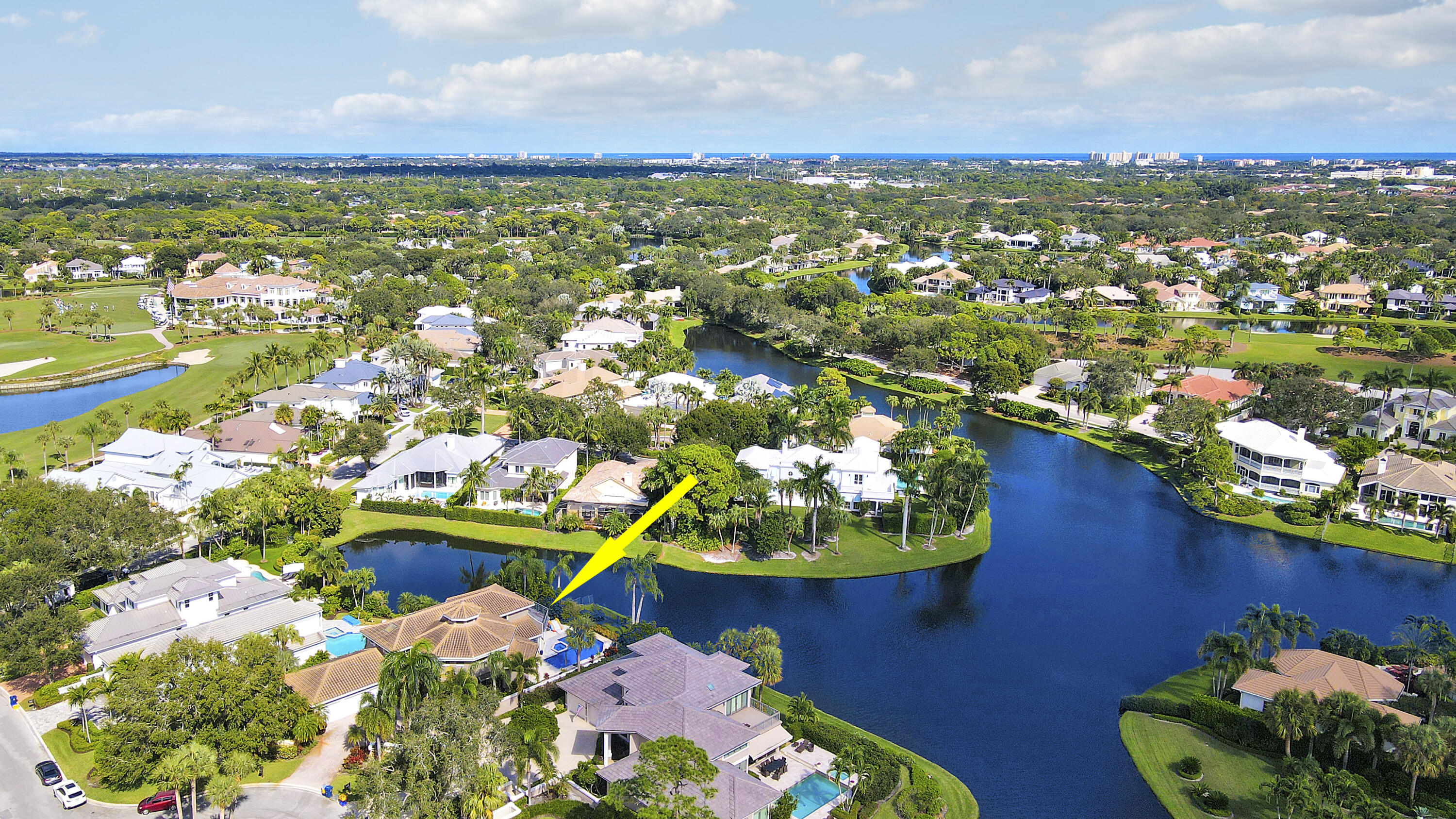 204 Chinook Lane Jupiter, FL 33458 - Photo 29 of 30 view of a lake with houses