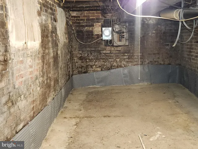 a view of a city street with cars