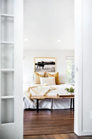 a room with a bed and a window