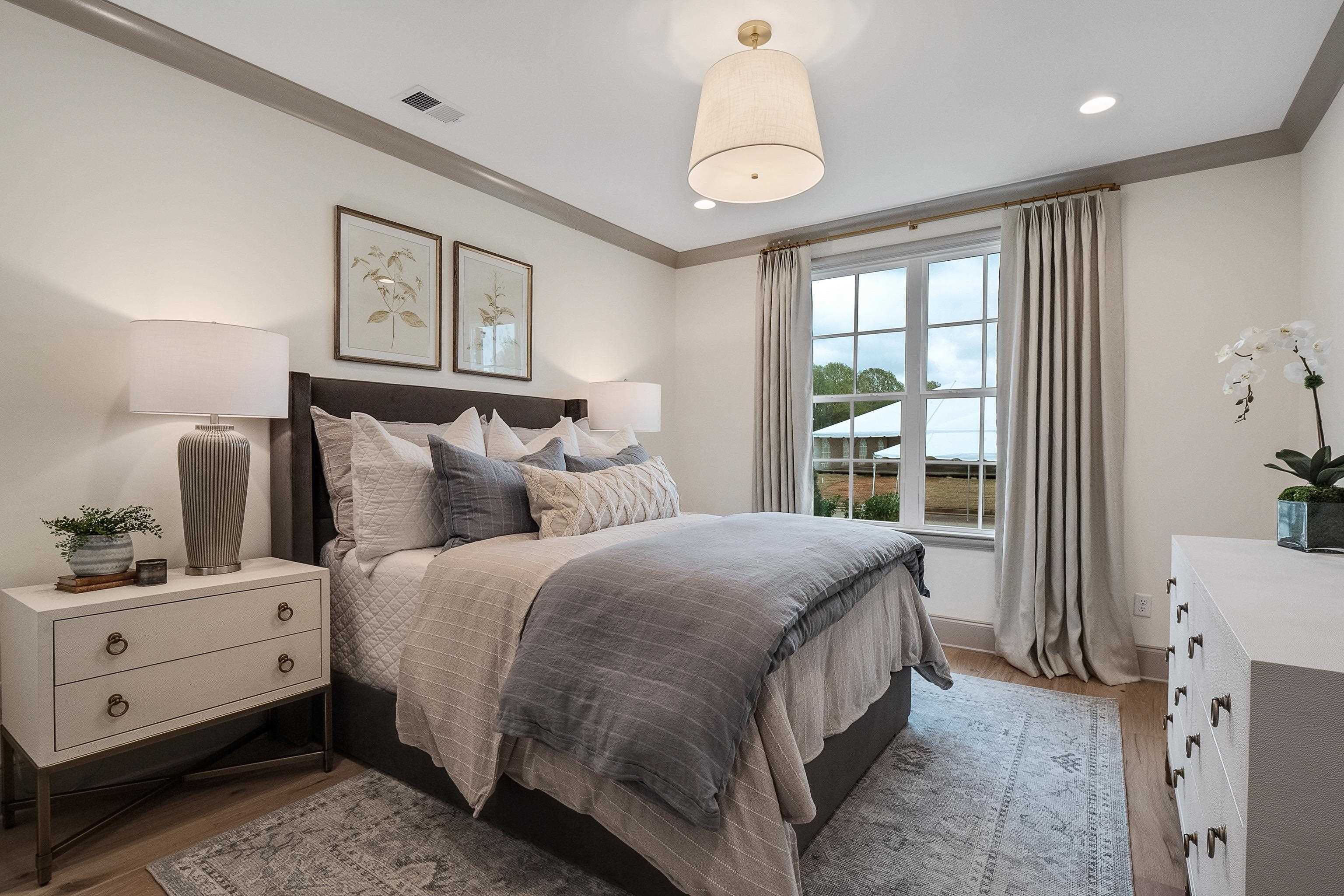 356 River Branch Drive Collierville, TN 38017 - Photo 12 of 31 a bedroom with a bed and a window