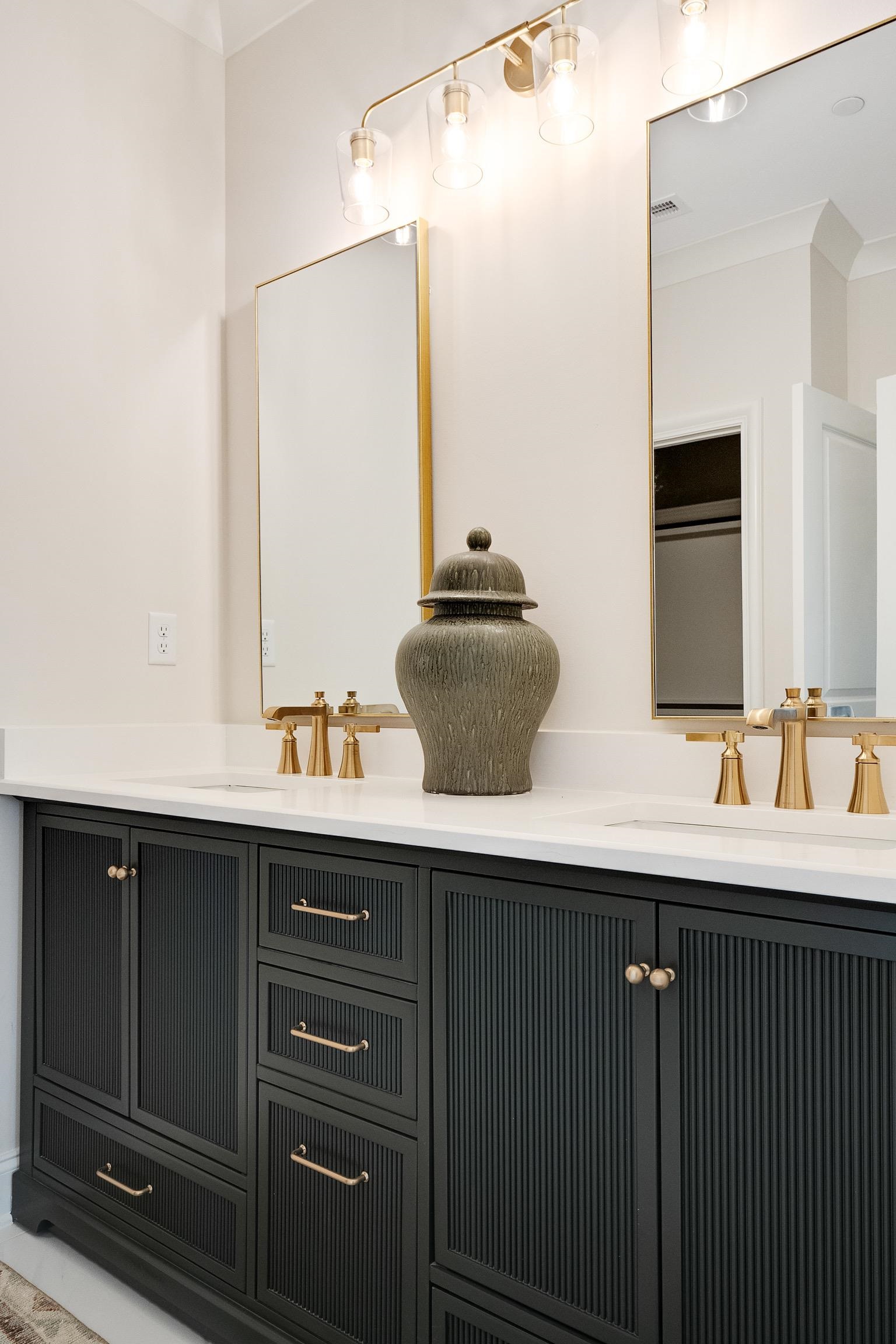 356 River Branch Drive Collierville, TN 38017 - Photo 24 of 31 a bathroom with a sink and a mirror