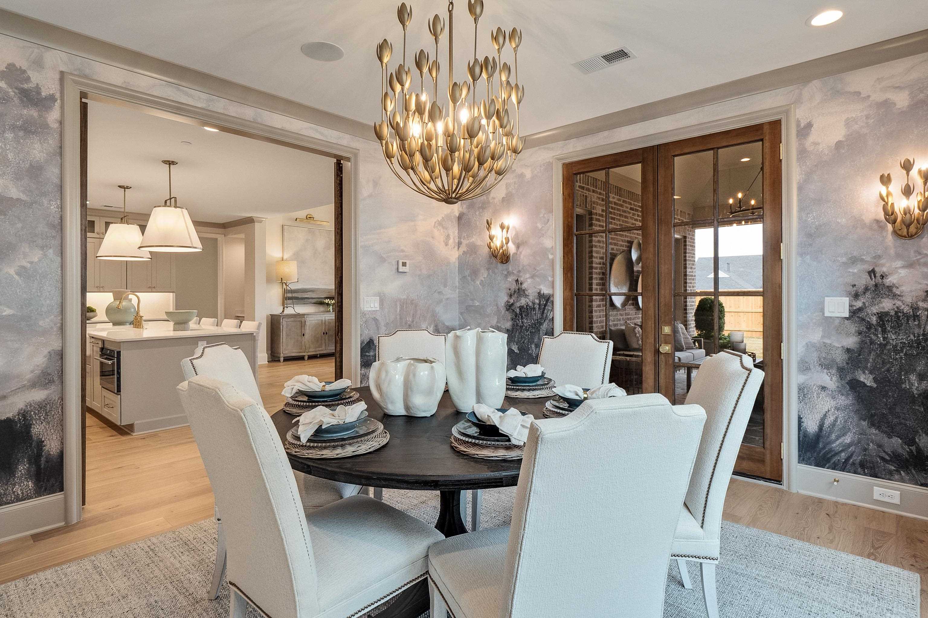 356 River Branch Drive Collierville, TN 38017 - Photo 26 of 31 a view of a dining room with furniture wooden floor and chandelier