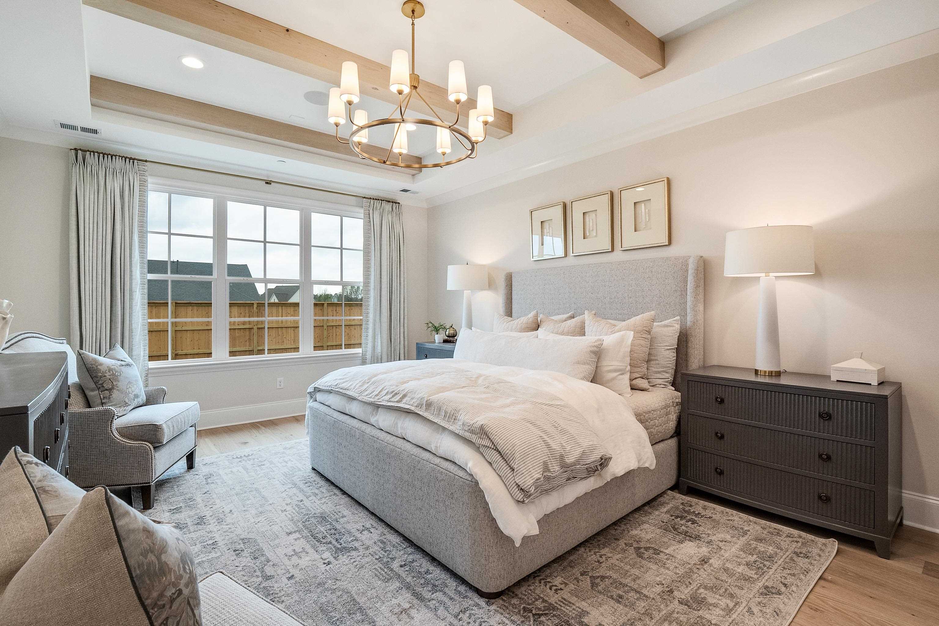 356 River Branch Drive Collierville, TN 38017 - Photo 8 of 31 a spacious bedroom with a bed and wooden floor