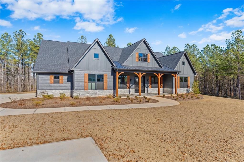 1374 Morgan Road Bremen, GA 30110 - Photo 2 of 50 a front view of a house with garden