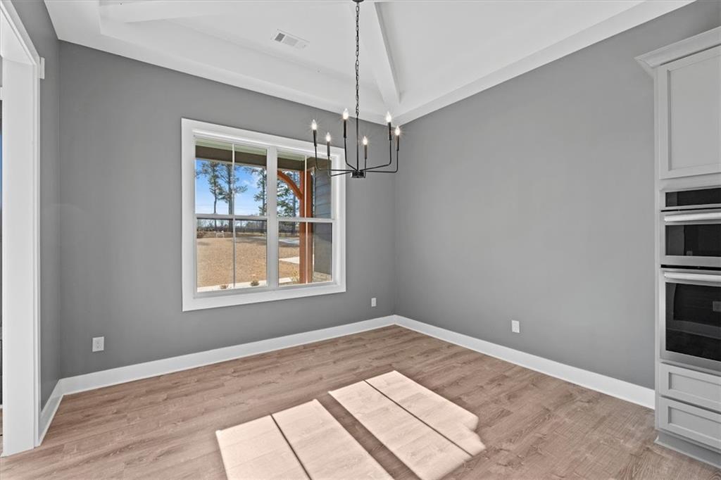 1374 Morgan Road Bremen, GA 30110 - Photo 22 of 50 a view of an empty room with a window