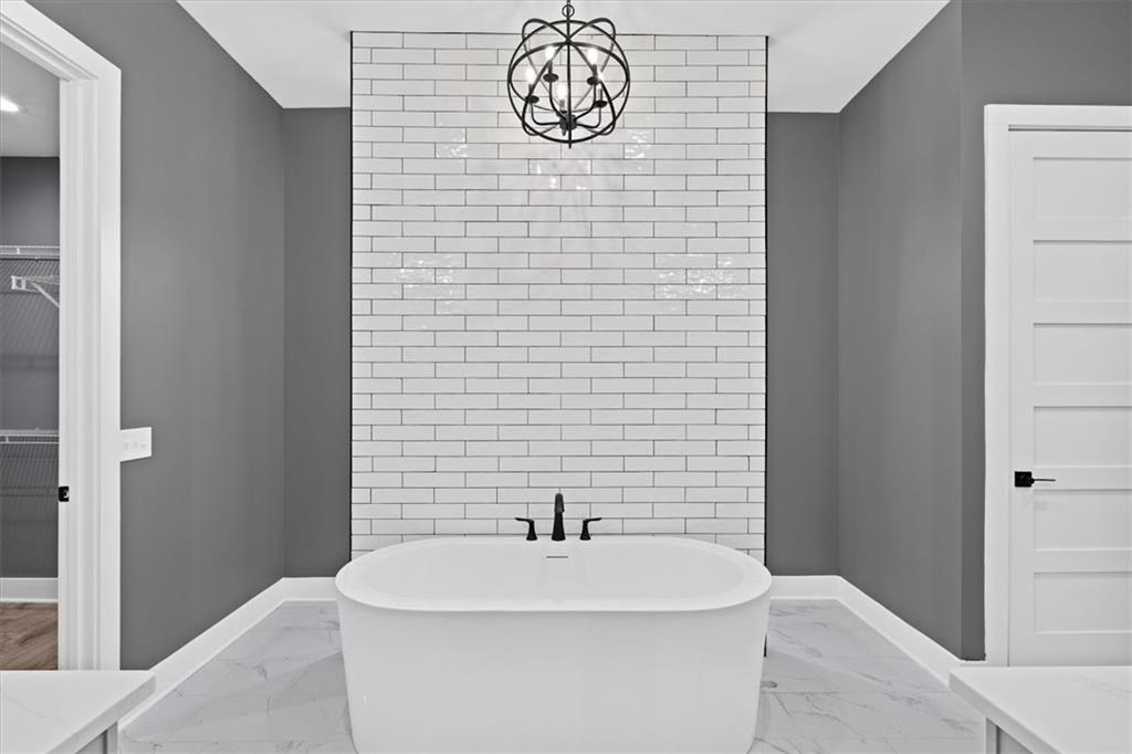 1374 Morgan Road Bremen, GA 30110 - Photo 26 of 50 a bathroom with a sink a toilet and a shower