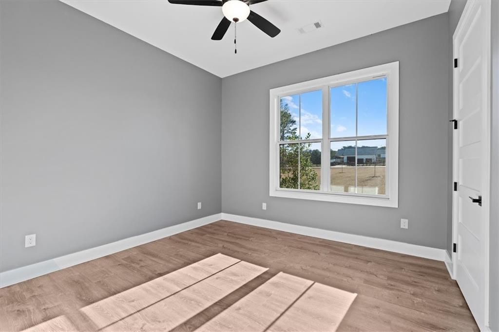 1374 Morgan Road Bremen, GA 30110 - Photo 31 of 50 a view of an empty room with a window